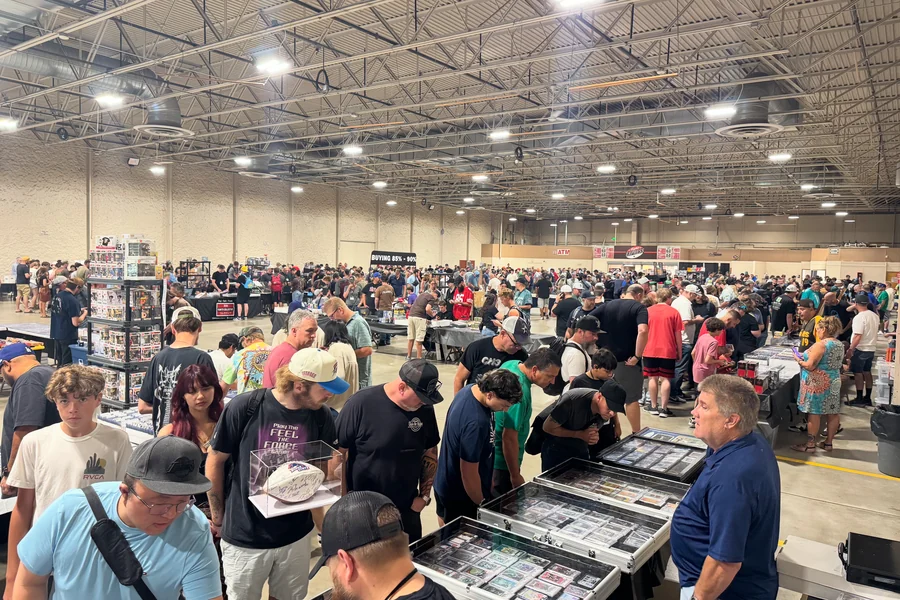 Crowds browsing tables of sports cards at the Boise Card Show Crowds browsing tables of sports cards at the Boise Card Show