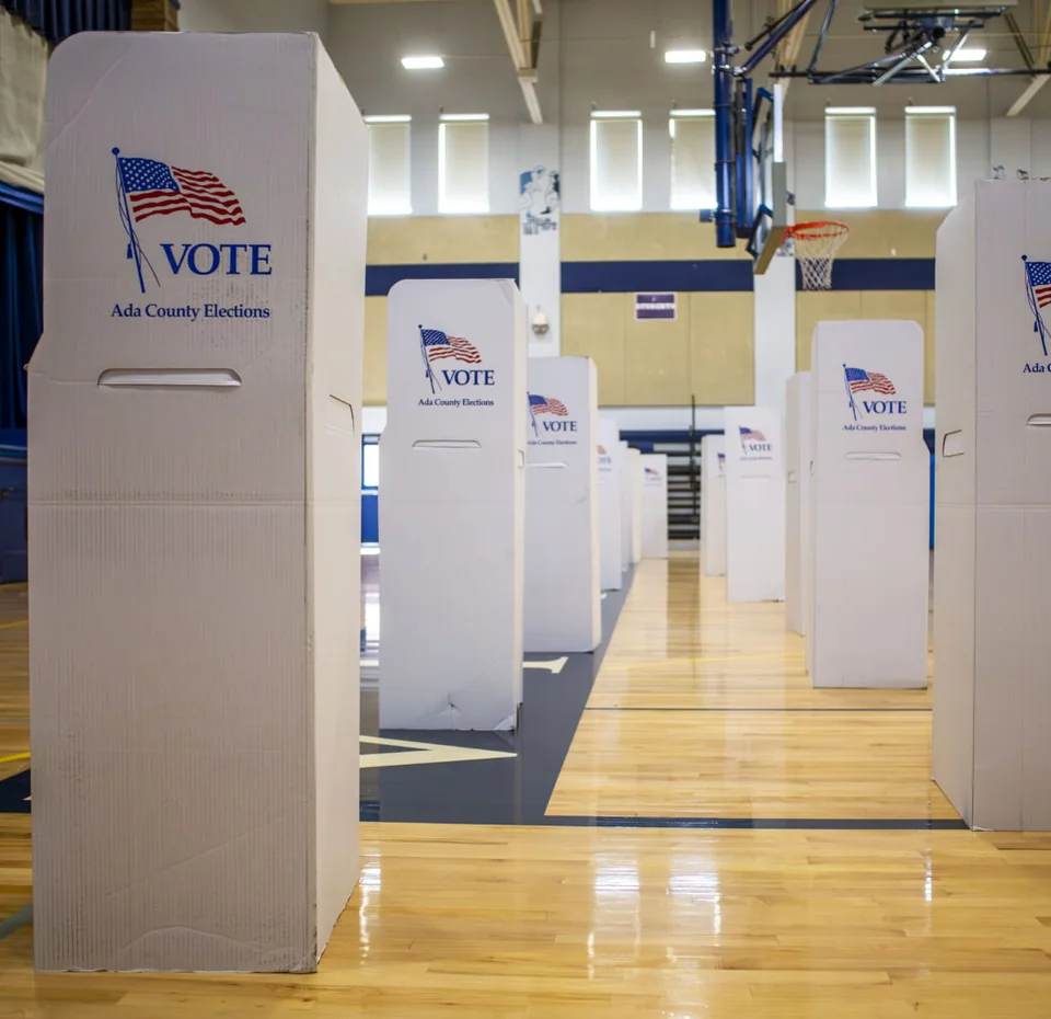 Ada County Elections voting booths set up in a school gym